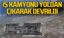 İş kamyonu yoldan çıkarak devrildi