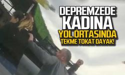 Depremzede kadına yol ortasında dayak!