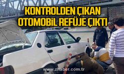 Kontrolden çıkan otomobil refüje çıktı