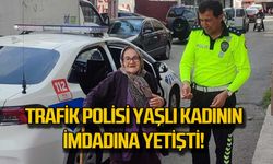 Trafik polisleri yaşlı kadının imdadına yetişti