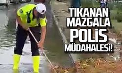 Tıkanan mazgala polis müdahalesi!