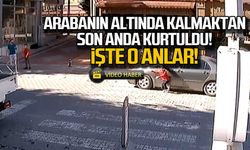 Arabanın altında kalmaktan son anda kurtuldu! İşte o anlar!