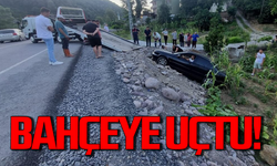 Karayolunda kontrolü kaybeden araç bahçeye uçtu!