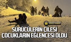 Kar yağışı sürücülerin çilesi, çocukların eğlencesi oldu