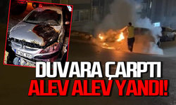 Duvara çarpan araç alev alev yandı: Sürücü ölümden döndü!