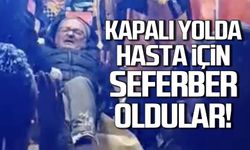 Kapalı yolda hastaya ulaşmak için seferber oldular