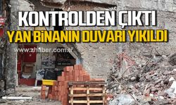 Zonguldak’ta yıkım kontrolden çıktı. Yan binanın duvarı zarar gördü.