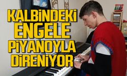 Kalbindeki engele piyano ile direniyor