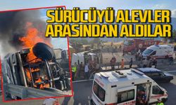 Devrilen tır alev alev yandı: Sürücüyü alevler arasından yaralı kurtardılar