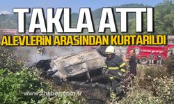 Çaycuma'da otomobil durağa çarpıp takla attı. Sürücü alevlerin arasından kurtarıldı.