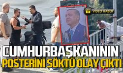 Cumhurbaşkanı Erdoğan’ın fotoğrafını söküp indirdi
