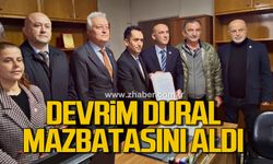 Devrim Dural mazbatasını aldı