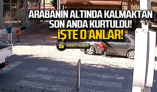 Arabanın altında kalmaktan son anda kurtuldu! İşte o anlar!