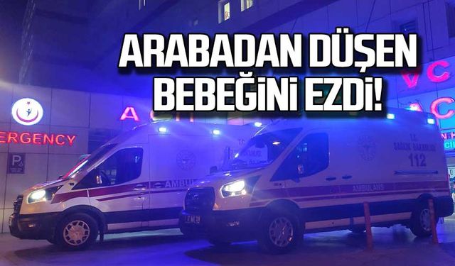 Arabadan düşen bebeğini ezdi!