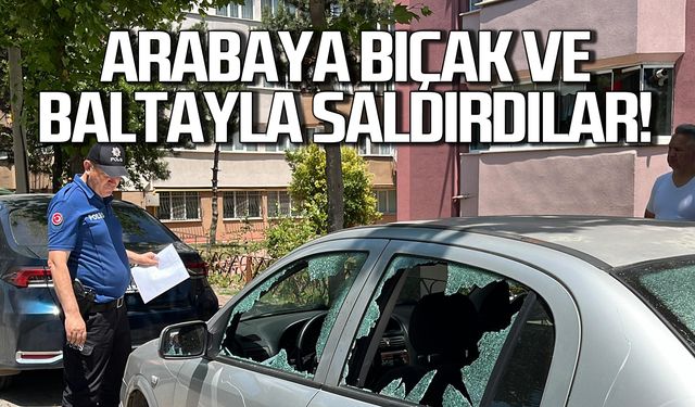 Arabaya bıçak ve baltayla saldırdılar!