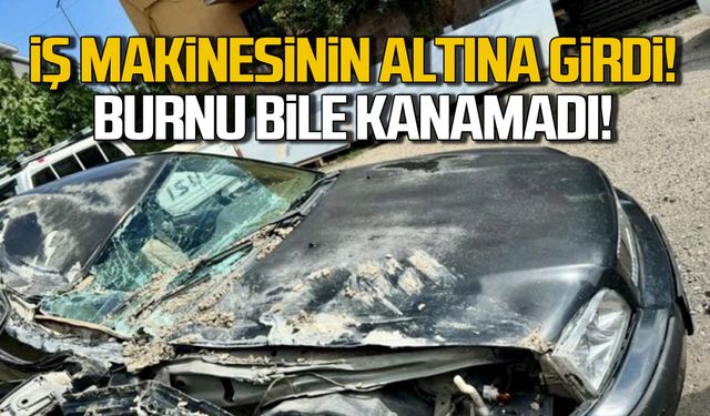 Bartın'da kaza! İş makinesinin altına girdi. Burnu bile kanamadı!