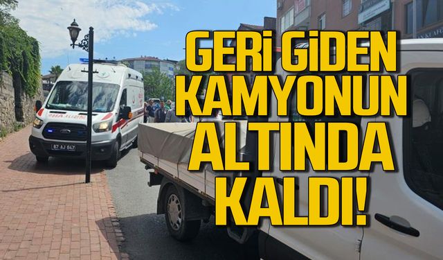 Geri giden kamyonun altında kaldı!