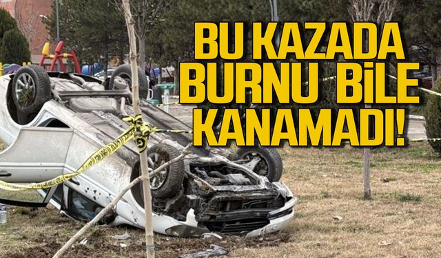 Ters dönen otomobilden burnu bile kanamadan çıktı!