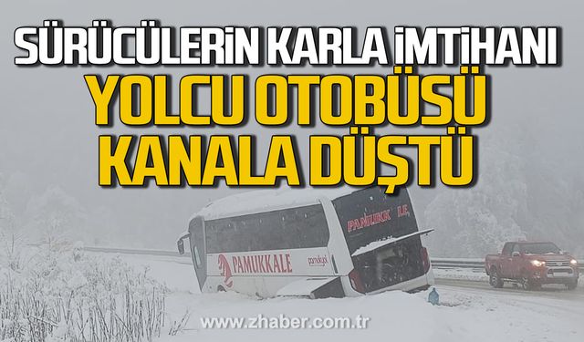 Ereğli'de sürücülerin karla imtihanı. Yolcu otobüsü kanala düştü.