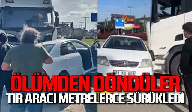 Ölümden döndüler: Tır otomobili metrelerce sürükledi!