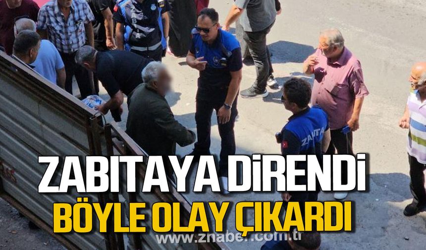 Zonguldak'ta yaşlı adam zabıtaya direndi. Kafasını demir kapılara vurdu.