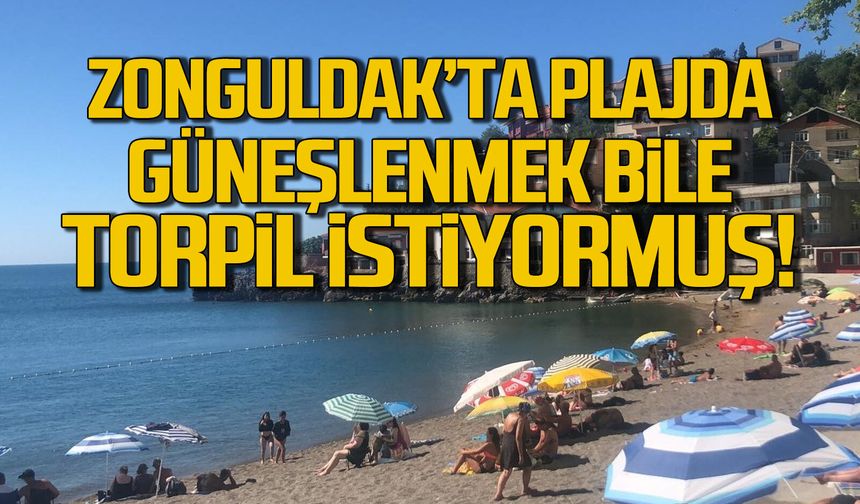 Denize girmek yasak güneşlenmek için torpil şart!